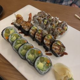 First roll is some kind of veggie, second shrimp third tuna