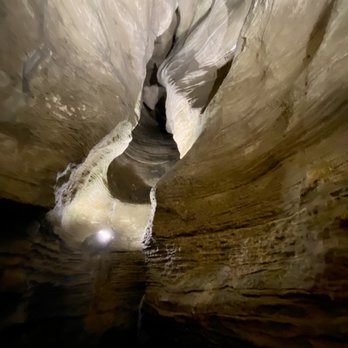 Howe Caverns - The winding Way is a 300 foot narrow passageway with about 30 curves ranging from 18 inches to 6 feet wide and 5 feet 245 feet high. - Tours Near Me - Howes Cave, New York