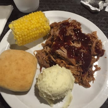 Wally's - Pulled pork with extra sauce added. - American Near Me - Charleston, Missouri