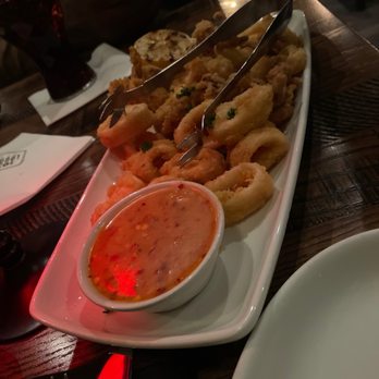 1933 Lounge - Calamari with chili sauce - Steakhouses Near Me - Fishers, Indiana 1933 Lounge - Calamari with chili sauce - Steakhouses Near Me - Fishers, Indiana