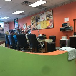 From the back of the shop sitting in the pedicure area! Shop is rather small but quaint. From the back of the shop sitting in the pedicure area! Shop is rather small but quaint.