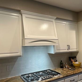 Janssen Custom Builders - a kitchen with white cabinets - General Contractors Near Me Janssen Custom Builders - a kitchen with white cabinets - General Contractors Near Me