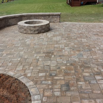 Harvell Landscaping - a brick patio with a fire pit - Landscaping Near Me - Clayton, North Carolina Harvell Landscaping - a brick patio with a fire pit - Landscaping Near Me - Clayton, North Carolina