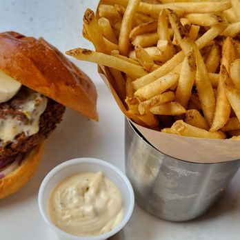 The Counter - Spicy Chicken Sandwich with Garlic Aioli Mozzarella Red Onions Fries - Burgers Near Me - Honolulu, Hawaii The Counter - Spicy Chicken Sandwich with Garlic Aioli Mozzarella Red Onions Fries - Burgers Near Me - Honolulu, Hawaii