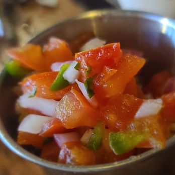 Westchester Taco Grill - a bowl of chopped tomatoes and onions - Mexican Near Me - New Rochelle, New York Westchester Taco Grill - a bowl of chopped tomatoes and onions - Mexican Near Me - New Rochelle, New York