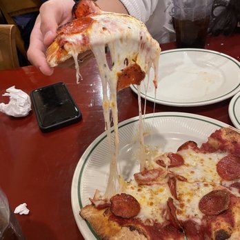 Maggie's Family Kitchen - Nice cheese pull! - Pizza Near Me - Corpus Christi, Texas