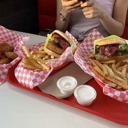 Fat Boy Burgers and Grill - Bbq bacon burger with onion rings, avocado bacon burger and a side of jalapeño poppers