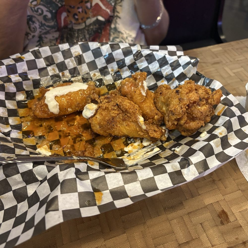 Ronny G's - Wings. These things rock. Both crispy and tender and spiced with the wing sauce is amazing. - Sports Bars Near Me - The Woodlands, Texas Ronny G's - Wings. These things rock. Both crispy and tender and spiced with the wing sauce is amazing. - Sports Bars Near Me - The Woodlands, Texas