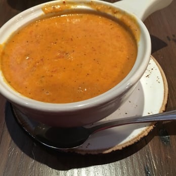 Jimmy P's Charred - Delicious soup of the day: Red roasted pepper cream and Curry.  Not very spicy. Generous portion for $5 - Steakhouses Near Me - Naples, Florida