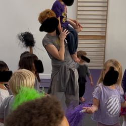 Wild Child Gym - Coach working so hard to make our child feel so special.