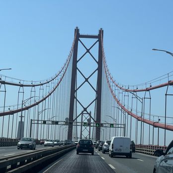 Ponte 25 de Abril - Heading south - Landmarks & Historical Buildings Near Me - Lisbon, 11 Ponte 25 de Abril - Heading south - Landmarks & Historical Buildings Near Me - Lisbon, 11
