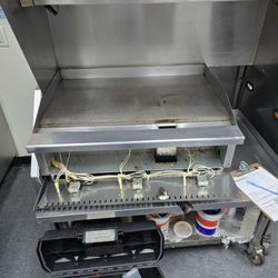 Quick Reliable Appliance Repair - Commercial griddle repair in progress - full gas line inspection and burner service.