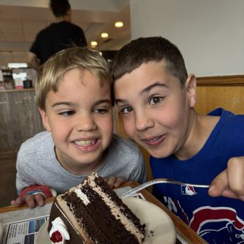 Maxim's Restaurant & Lounge - Sylvester and Rodger Burkhart having their chocolate cake for breakfast - Pizza Near Me - Merrillville, Indiana