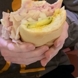 Lennys Grill & Subs - #6 American Club with yellow mustard, onions, and pickles.