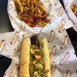 Italian sausage with hot peppers and a basket of fries.. they're value meal, comes with a drink as wel..