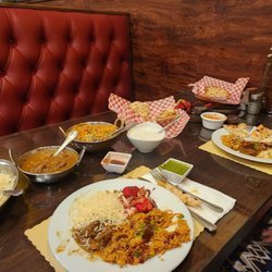Tandoori Flames - Saffron Rice,Lamb Curry,Goat Biryani,Butter,Garlic & Onion Naan,Tamarind sauce, Mint Jalepeno Chutney,
