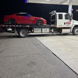 ARC Towing - They take care of my car loading it making shore it didn't strapped on the bed. They did a good job
