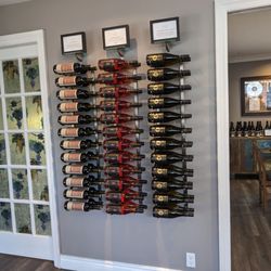 Niagara Custom Crush Studio - Wine lines the walls in here