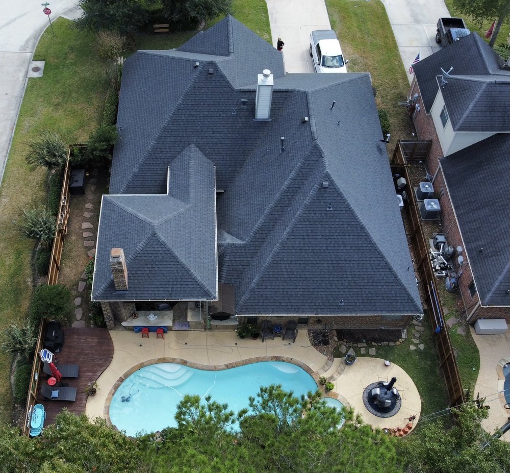 Slide of REAL Roofing and Construction