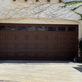 American Home Solutions - Clean new paint job on the garage doors - General Contractors Near Me