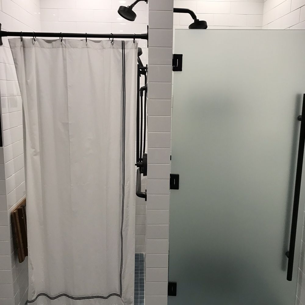 Five Iron Golf - Bathroom Showers - Golf Near Me - Seattle, Washington Five Iron Golf - Bathroom Showers - Golf Near Me - Seattle, Washington