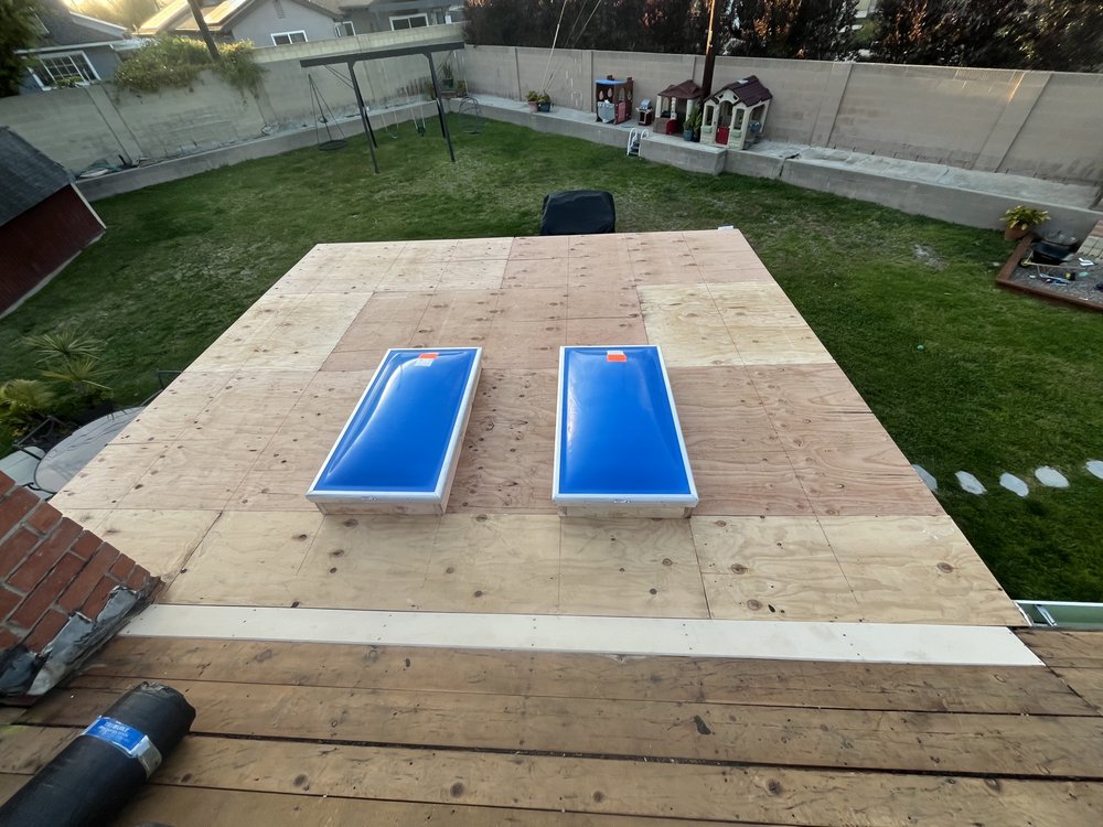 Slide of T’s Roofing 