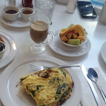 More Than Waffles - Veggie omelet with waffles and almond latte for me and french toast with fruits and scrambled eggs + hot chocolate for my boyfriend - Breakfast & Brunch Near Me - Encino, California More Than Waffles - Veggie omelet with waffles and almond latte for me and french toast with fruits and scrambled eggs + hot chocolate for my boyfriend - Breakfast & Brunch Near Me - Encino, California