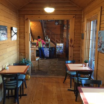 Roots Farm Cafe - Cute couple tables setup along hallway - Coffee & Tea Near Me - Tijeras, New Mexico Roots Farm Cafe - Cute couple tables setup along hallway - Coffee & Tea Near Me - Tijeras, New Mexico