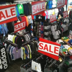Sports Direct - I think there's a sale. If only there was a sign saying so!.
