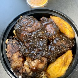 Mac West Indian Restaurant & Ice Cream - Jerk Chicken with Fries and Plantains