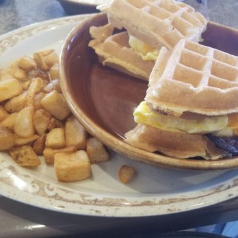 Another Broken Egg Cafe - Waffle sliders are amazing. Wish I did get a separate bowl to fill with syrup. Then I could have dipped the one I was eating in each bite. - Breakfast & Brunch Near Me - Jacksonville Beach, Florida