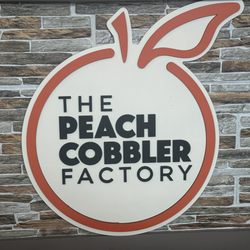 The Peach Cobbler Factory - Logo