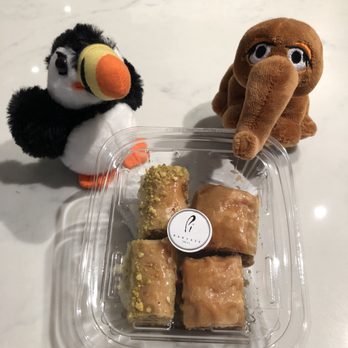 Pi Bakerie - Mini Baklavas to-go: Pistachio on left, Traditional on right. (And, that is Puffy on left, and Snuffy on right.) - Bakeries Near Me - New York, New York Pi Bakerie - Mini Baklavas to-go: Pistachio on left, Traditional on right. (And, that is Puffy on left, and Snuffy on right.) - Bakeries Near Me - New York, New York