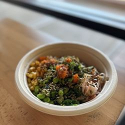 Poke Paradise- Sushi Bowls & Boba Teas - 2 protein poke bowl (salmon & yellow tail) Sauces: house spicy & creamy sesame. Unique in bowl: shirataki noodles and shichimi togarashi