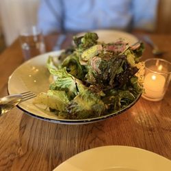 L'Oursin - salade fermière - farm lettuces with a whipped goat cheese, fines herbes, radishes, sunflower seeds and Dijon vinaigrette GF V