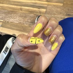 Ispa Nails - Liquid gel with tips, yellow and gold shimmer . Stiletto style
