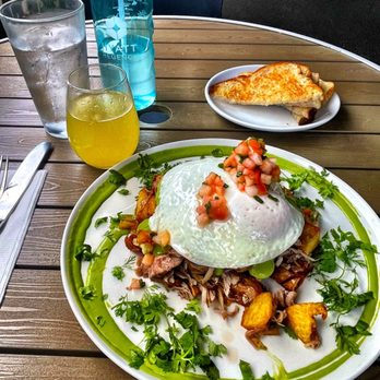 Over Easy - Kailua pig with fried egg, salsa, guacamole and potatoes. - Breakfast & Brunch Near Me - Kailua, Hawaii Over Easy - Kailua pig with fried egg, salsa, guacamole and potatoes. - Breakfast & Brunch Near Me - Kailua, Hawaii