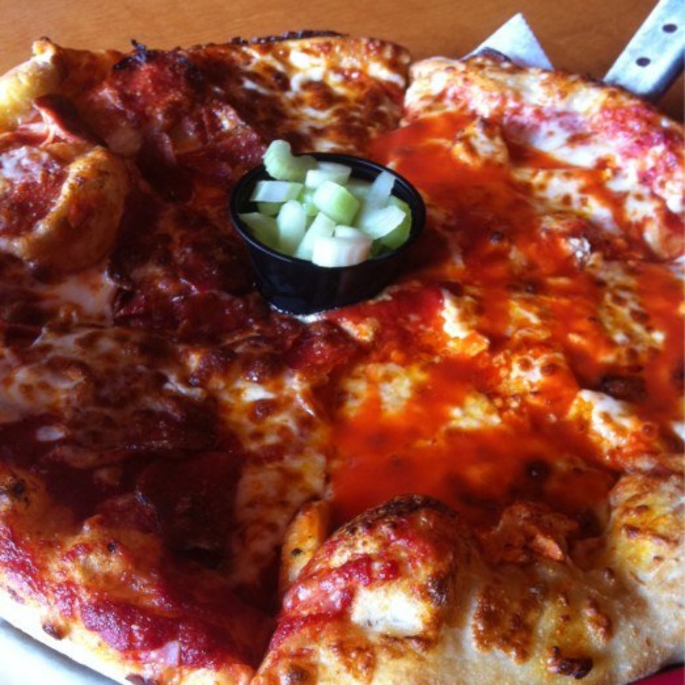 Half pepperoni. Half buffalo chicken. Half pepperoni. Half buffalo chicken.