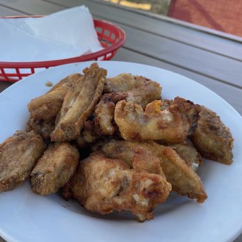 Cat & Fiddle Pub - Pound of world famous wings dry garlic $12/pound - Pubs Near Me - Port Coquitlam, British Columbia