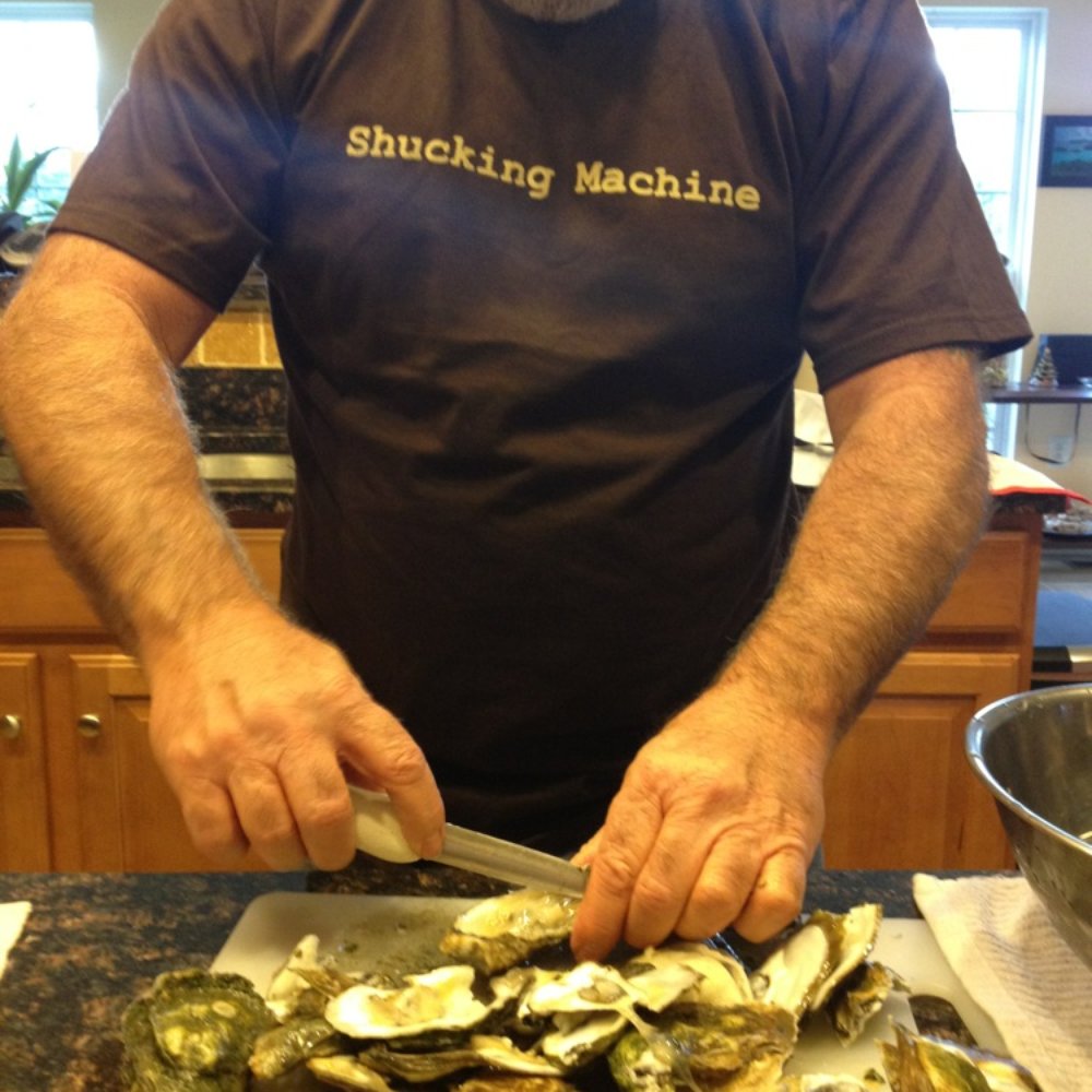 Fish 101 - Shucking machine, Mike Hurley, in action shucking some blue points on the east coast! - Seafood Near Me - Encinitas, California Fish 101 - Shucking machine, Mike Hurley, in action shucking some blue points on the east coast! - Seafood Near Me - Encinitas, California