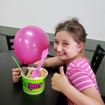 LimeBerry - a young girl sitting at a table with a pink balloon - Ice Cream & Frozen Yogurt Near Me - Lacey, Washington LimeBerry - a young girl sitting at a table with a pink balloon - Ice Cream & Frozen Yogurt Near Me - Lacey, Washington