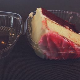 Red velvet and vanilla cake with cream cheese and butter cream frosting. Red velvet and vanilla cake with cream cheese and butter cream frosting.