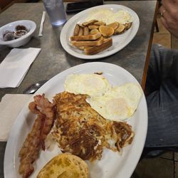 Coney Island Inn - Two egg breakfast one with hash browns one with fried potatoes.