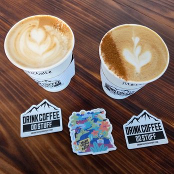 Drink Coffee Do Stuff - left: with fresh coconut garnish is the pink velvet latte, and the alpenglow almond latte with oatmilk. - Coffee Roasteries Near Me - Reno, Nevada