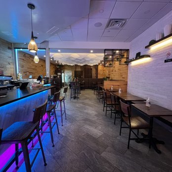 Spring Thai Fusion & Bar - Shot from the bar to the back - Thai Near Me - New york, New York Spring Thai Fusion & Bar - Shot from the bar to the back - Thai Near Me - New york, New York