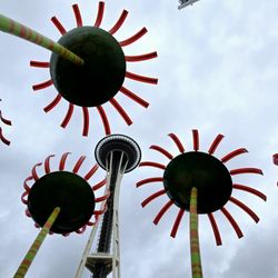 Seattle Center - Sonic Bloom and Space Needle amid a gloomy sky
