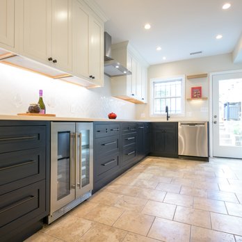 Balaton Builders - a modern kitchen with white cabinets and black appliances - Interior Design Near Me - Washington, DC, District of Columbia Balaton Builders - a modern kitchen with white cabinets and black appliances - Interior Design Near Me - Washington, DC, District of Columbia