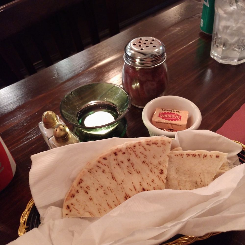 Some bread and butter before the food comes Some bread and butter before the food comes