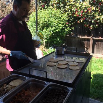 Taquiza's Dona Mari - Working the grill - Caterers Near Me Taquiza's Dona Mari - Working the grill - Caterers Near Me