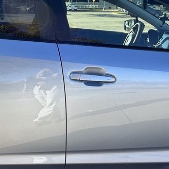 DFW Bumper Solutions - Car after repair (fixed dent, scratches buffed out and paint redone and matched, with new tire trims put on) - Mobile Dent Repair Near Me